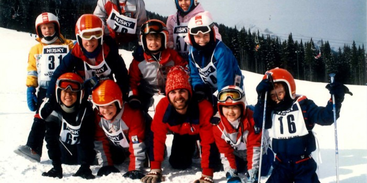 Quikies ski racing team posing at Mount Norquay, early 1980s.